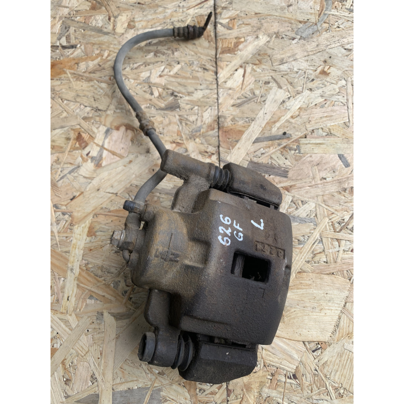 Супорт гальмівний передній лівий Mazda 626 GF