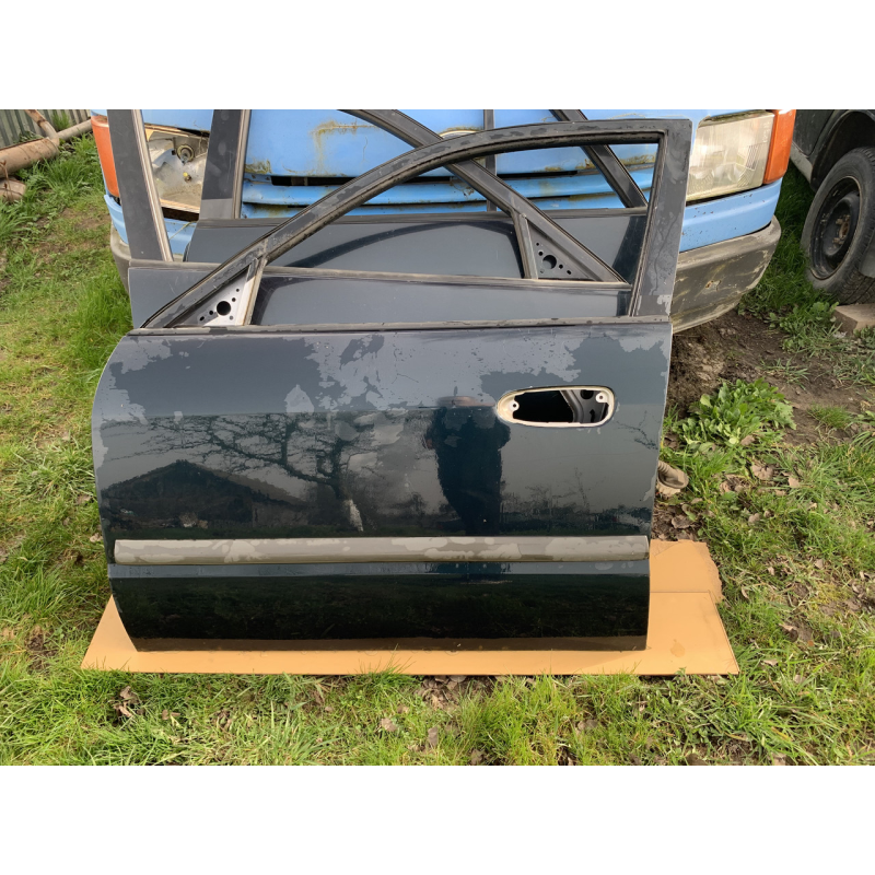 Двері передні ліві Mazda 626 GF