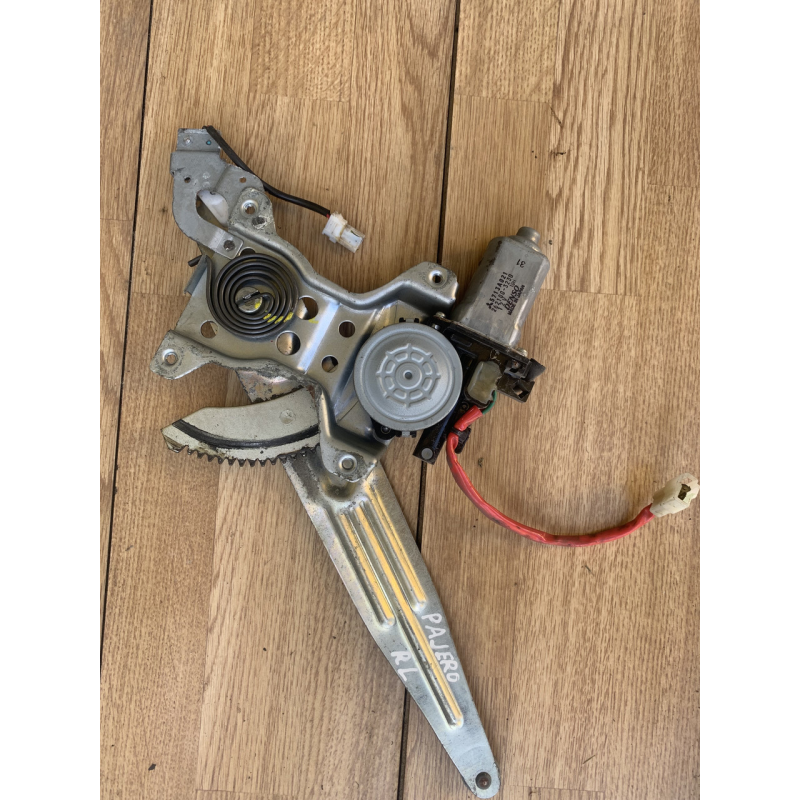 Склопідйомник Mitsubishi Pajero Sport задній лівий 5713A021 Склопідйомник Mitsubishi Pajero Sport задній лівий 5713A021