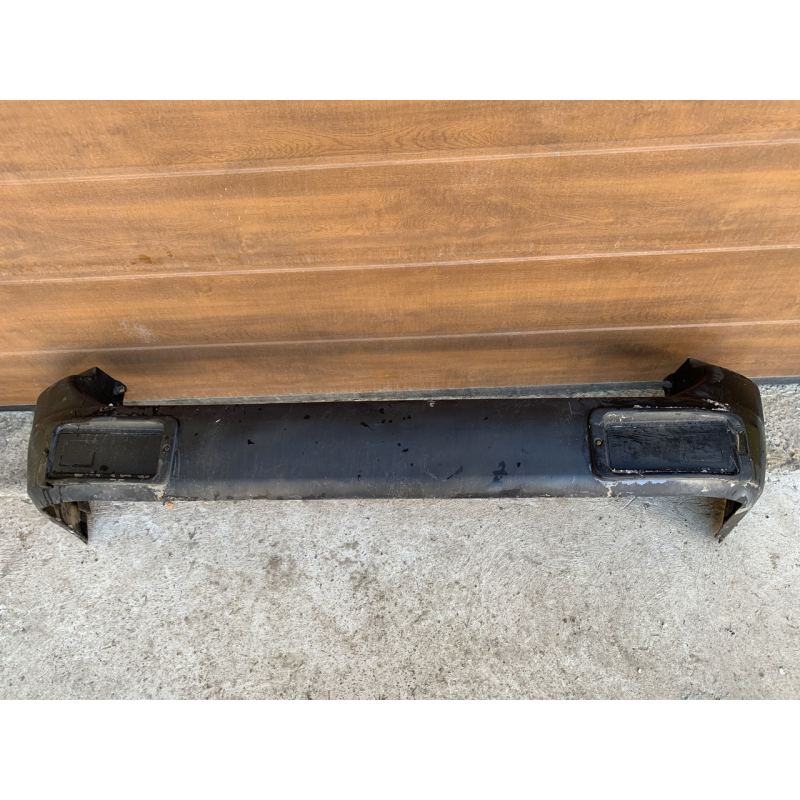 Бампер задній Mitsubishi Pajero Sport 1