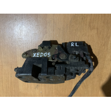 Замок дверей задній лівий Mazda Xedos 6