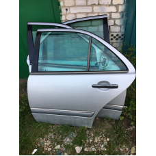 Дверка задня ліва Mercedes W210