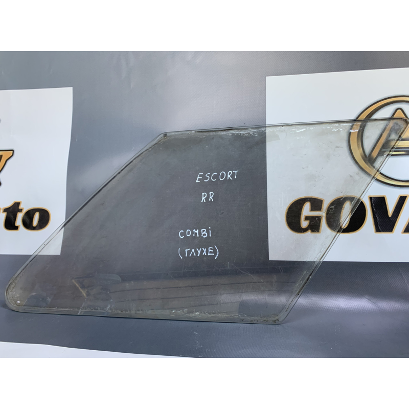 Скло дверей заднє праве (глухе) Ford Escort MK4 Combi