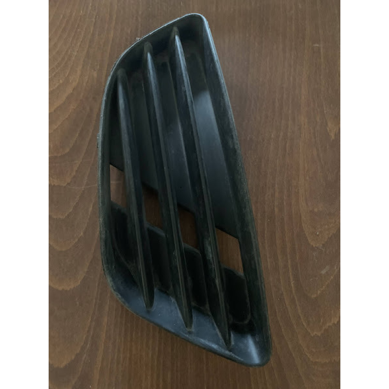 Решітка / накладка бампера права Ford Fiesta 2S6119952A